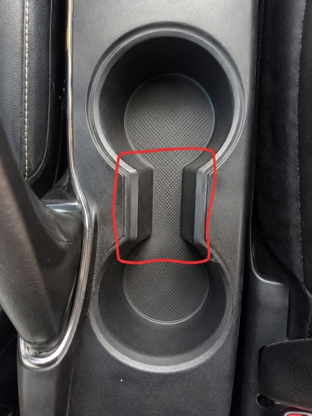 🚗 What Is the Weird Gap Between Car Cup Holders For?
